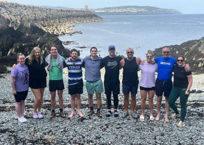 A photo of the team sea swimming for Mental Health Awareness Week