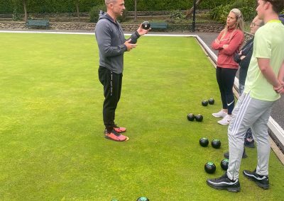 Ciaran teaching the team how to play bowls