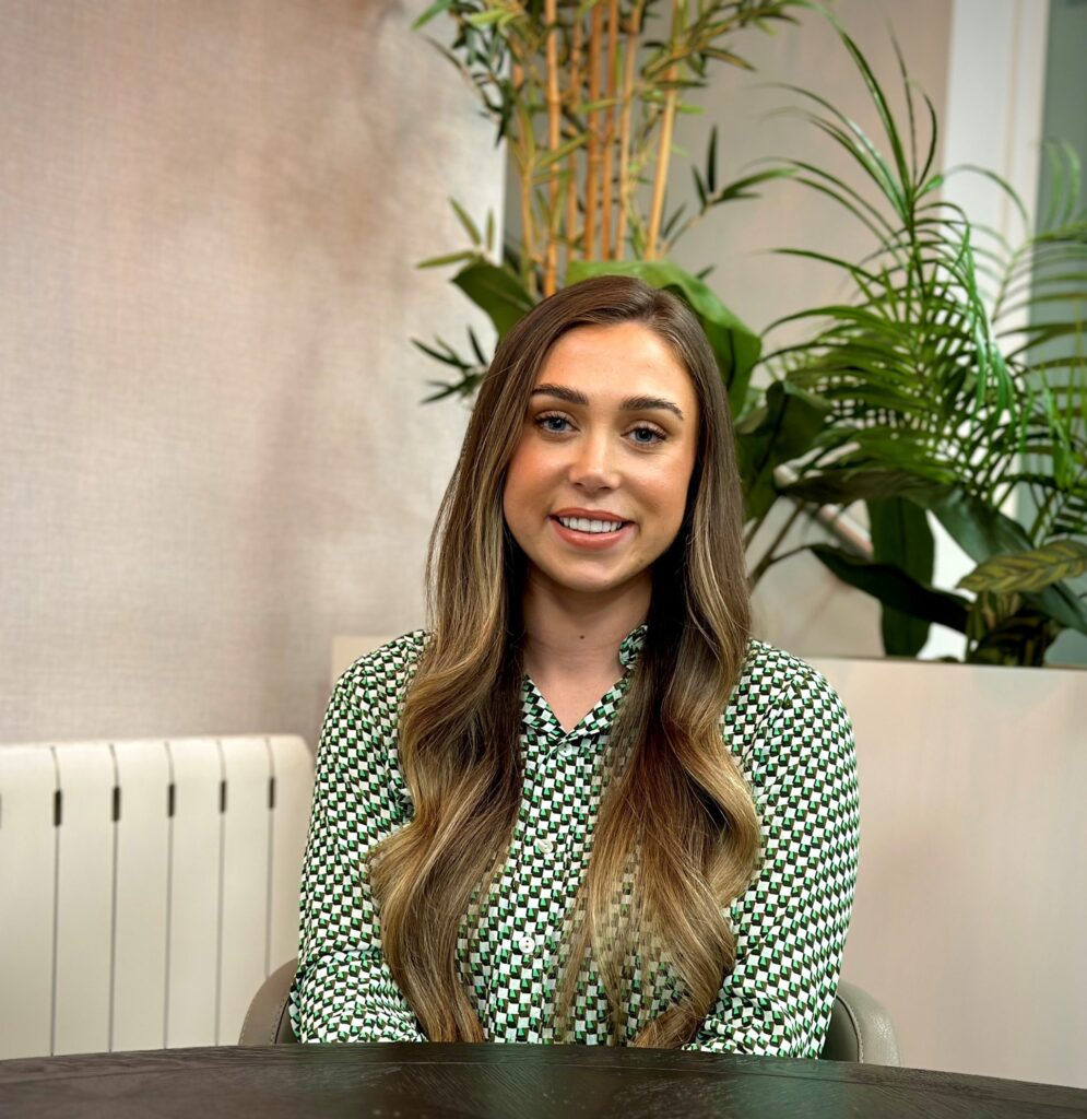 A seated portrait of Samantha Hall