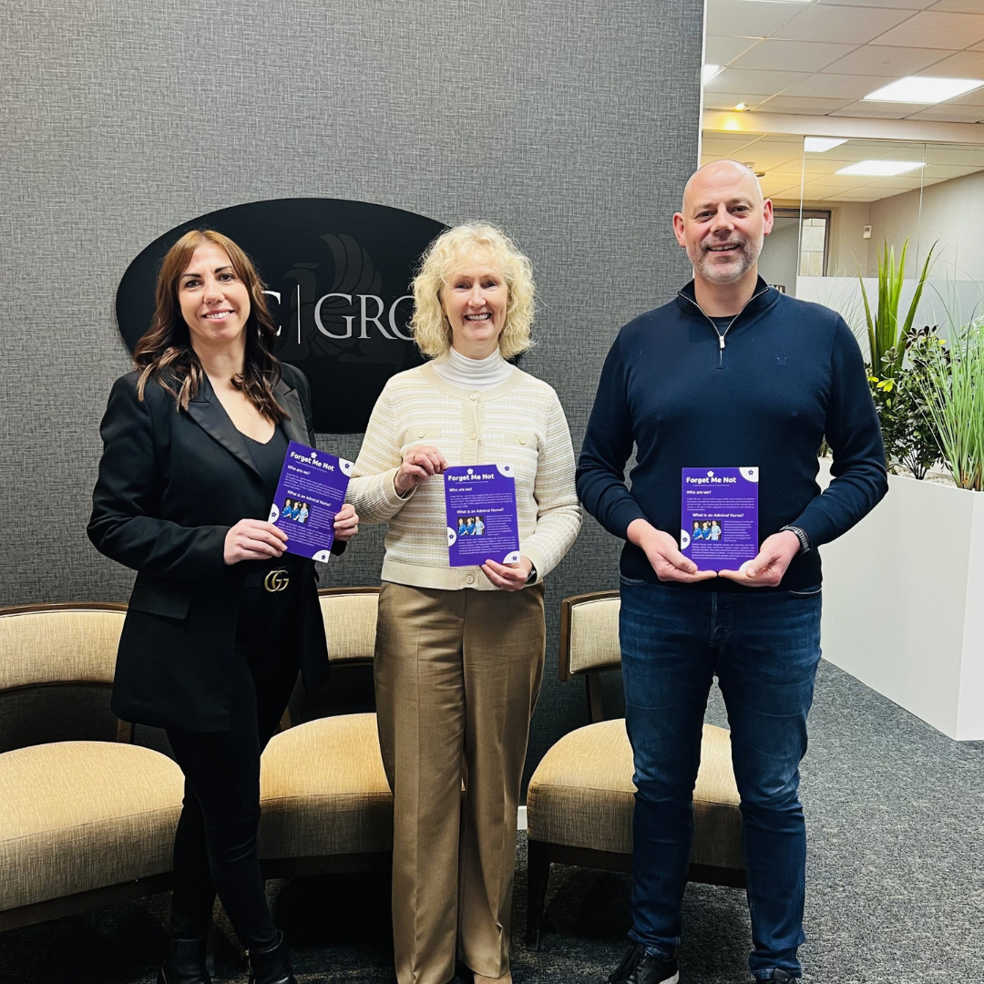 A photo of Rebecca Netten and Ed Walter from MAC Group with Gemma Wild from Forget Me Not