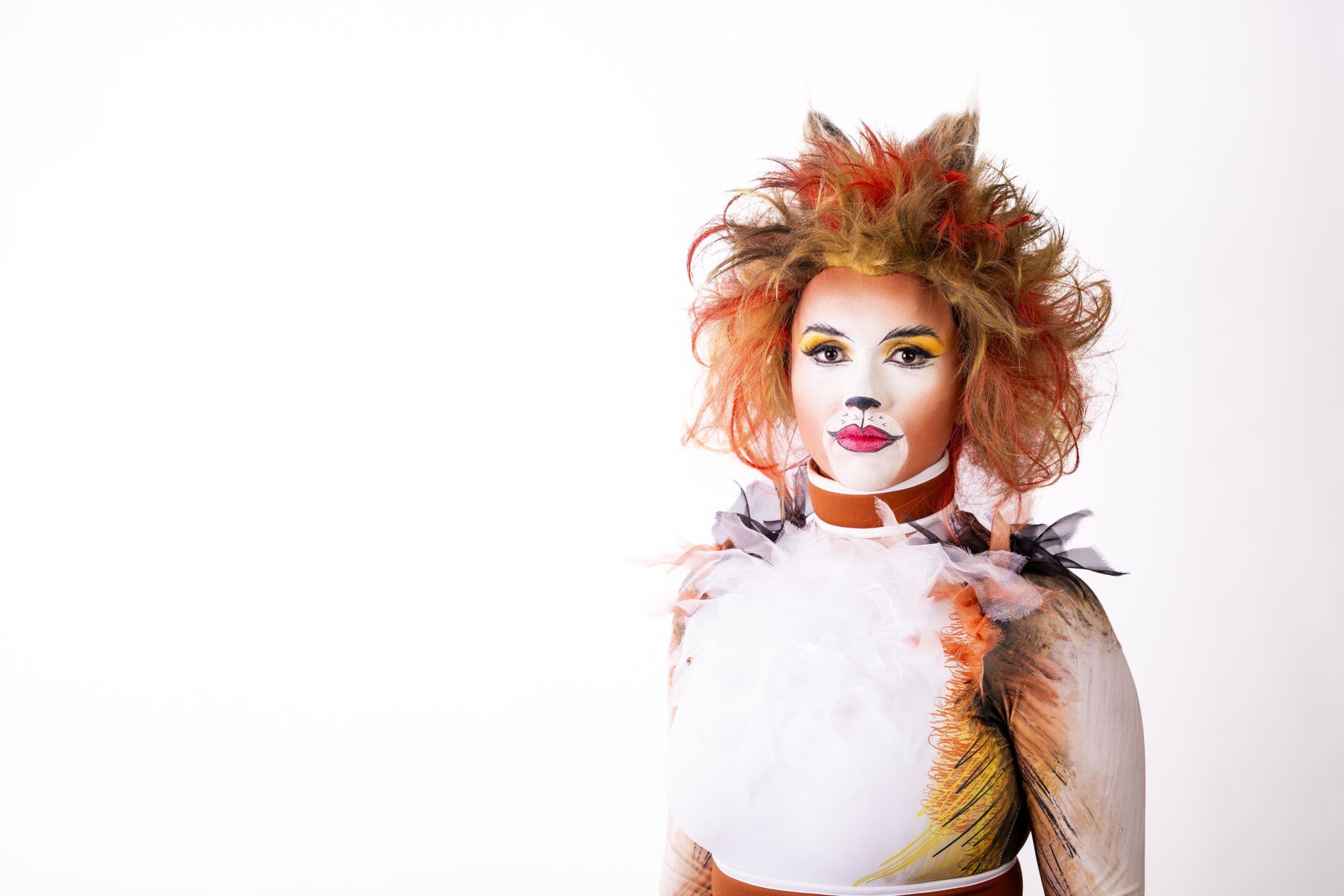 A portrait of Georgia dressed in her Cats costume